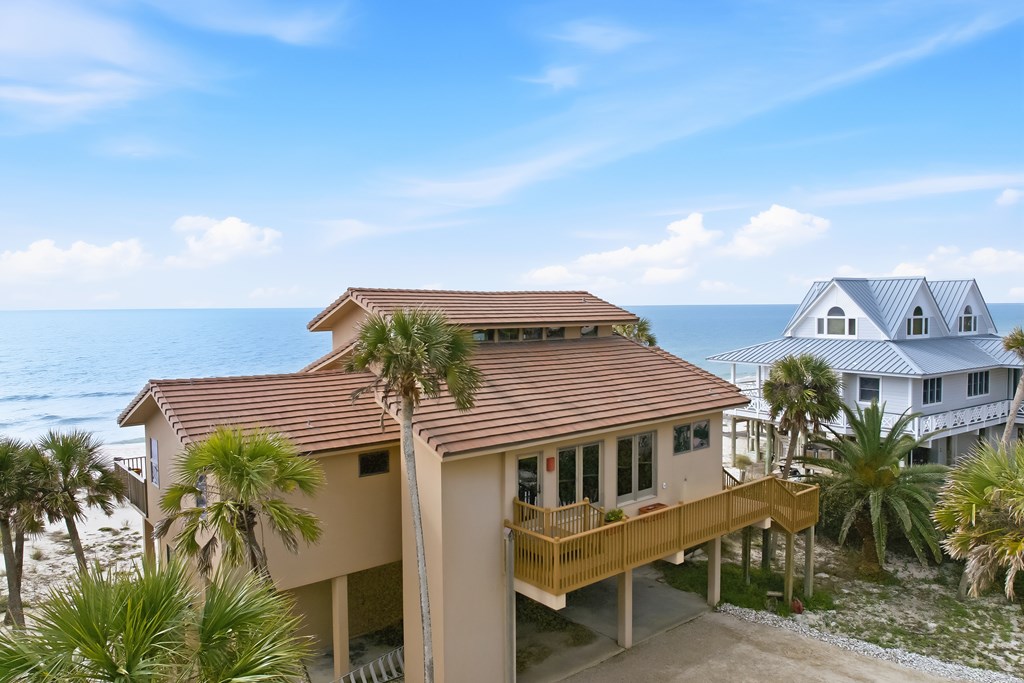 Located within a highly desirable gated coastal community, this never- – image 2