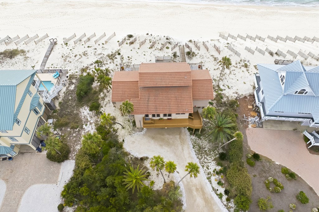 Located within a highly desirable gated coastal community, this never- – image 13