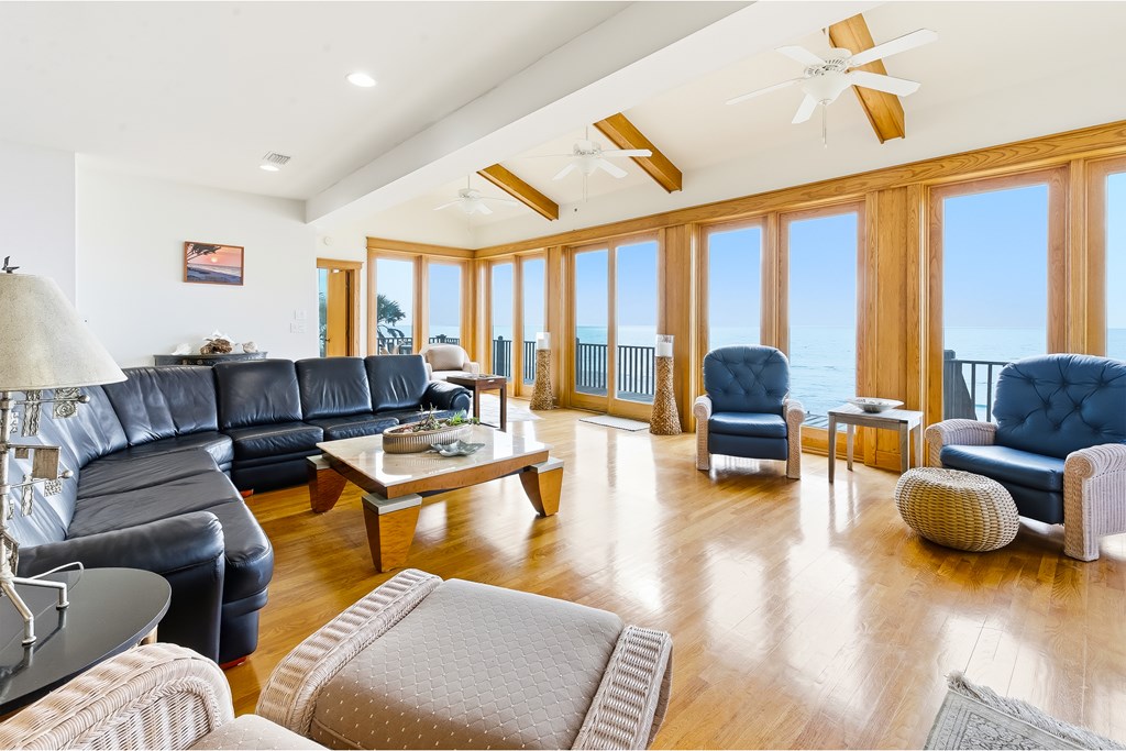 Located within a highly desirable gated coastal community, this never- – image 19