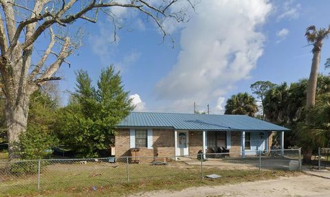 Photo of 405 Ave A, Port Saint Joe, FL 32456 (MLS # 327958)