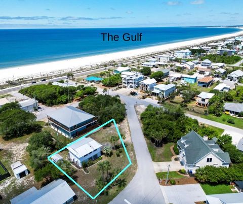 Photo of 63 Oak Ave, Mexico Beach, FL 32456 (MLS # 328334)