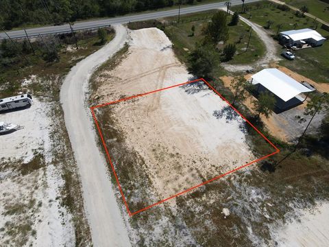 Photo of 113 Yellowfin Dr, Overstreet, FL 32456 (MLS # 324132)