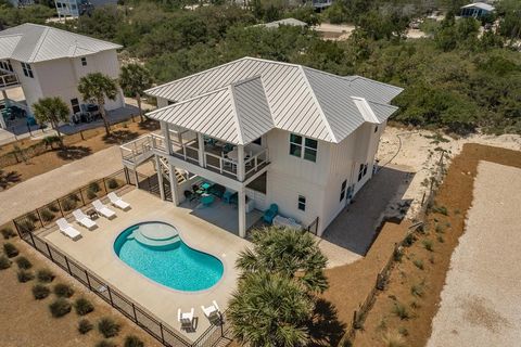 Photo of 557 W Gulf Beach Dr, Saint George Island, FL 32328 (MLS # 327937)