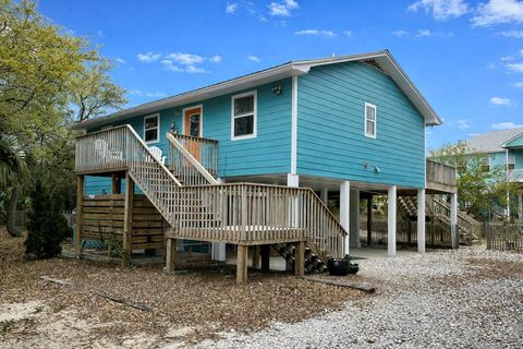 Photo of 1064 W Gulf Beach Dr, Saint George Island, FL 32328 (MLS # 327748)