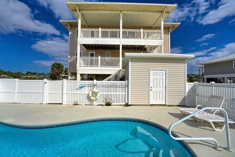 Photo of 916 E Gulf Beach Dr, Saint George Island, FL 32328 (MLS # 321319)