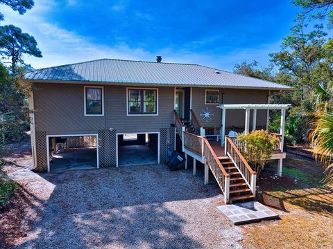 Photo of 848 E Pine Ave, Saint George Island, FL 32328 (MLS # 327709)