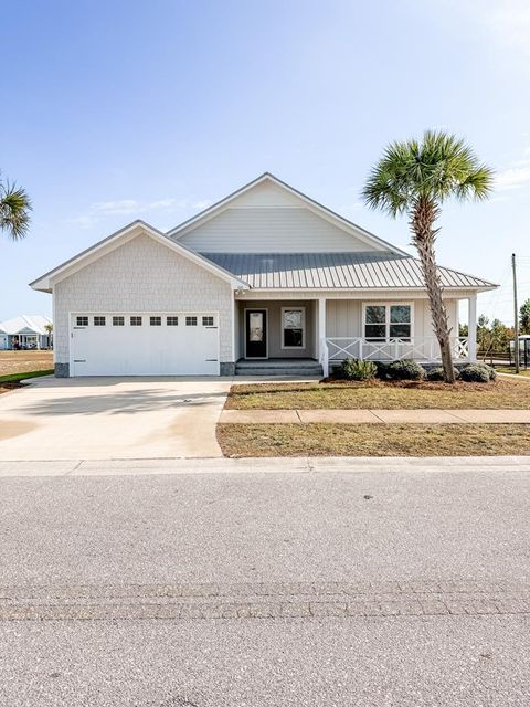 Photo of 100 St Frances St, Mexico Beach, FL 32456 (MLS # 324658)