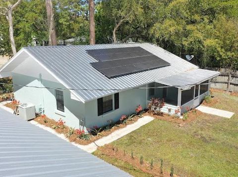 Photo of 443 Boatwright St, Eastpoint, FL 32328 (MLS # 327665)