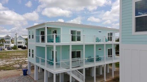 Photo of 105 Circle Dr, Mexico Beach, FL 32456 (MLS # 328491)