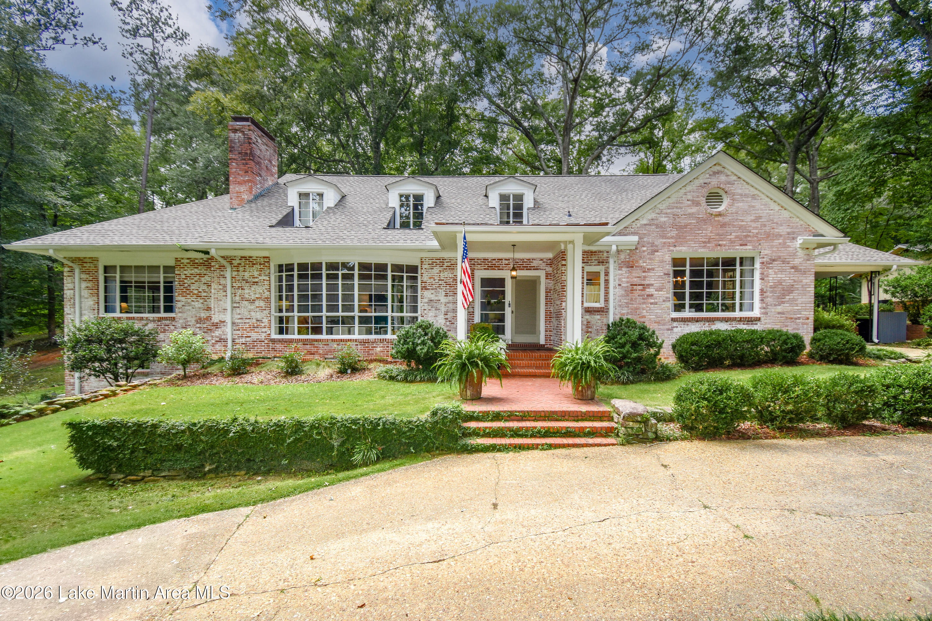 Front of home, hidden from street view