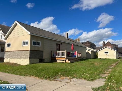 Photo of 218 6th St, Chisholm, MN 55719 (MLS # 149191)