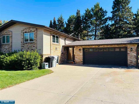 Photo of 635 8th St NW ST, Chisholm, MN 55719 (MLS # 150793)