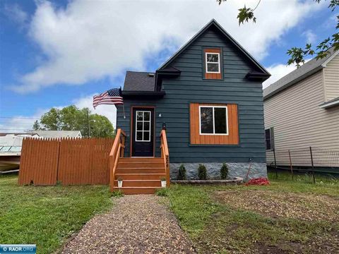 Photo of 224 3rd St NW, Chisholm, MN 55719 (MLS # 150106)