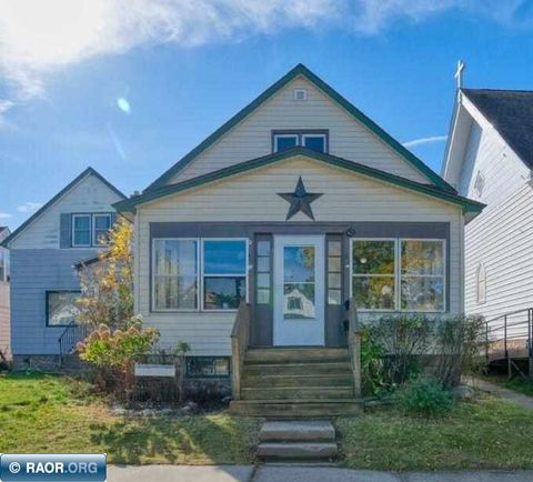 Photo of 25 3rd St SW St, Chisholm, MN 55719 (MLS # 149123)