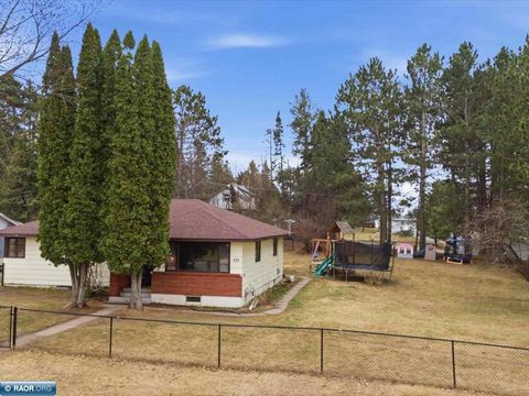 Photo of 335 9th St NE St, Chisholm, MN 55719 (MLS # 149821)