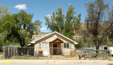 Photo of 104 W Main Street, Naturita, CO 81422 (MLS # 833942)