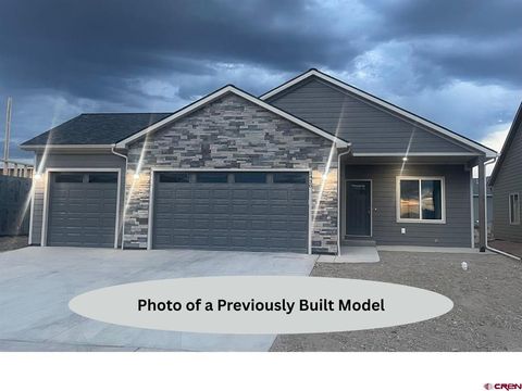 Photo of 115 Fivemile Creek Avenue, Montrose, CO 81401 (MLS # 830703)