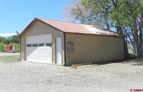 Photo of 1720 6450 Road #Finished Garage - Un, Montrose, CO 81401 (MLS # 829538)