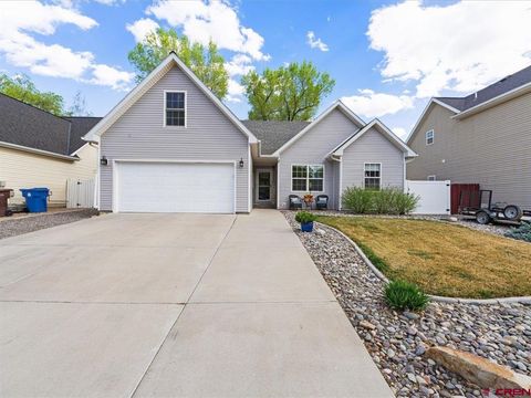 Photo of 1416 Colonial Drive, Montrose, CO 81401 (MLS # 832947)