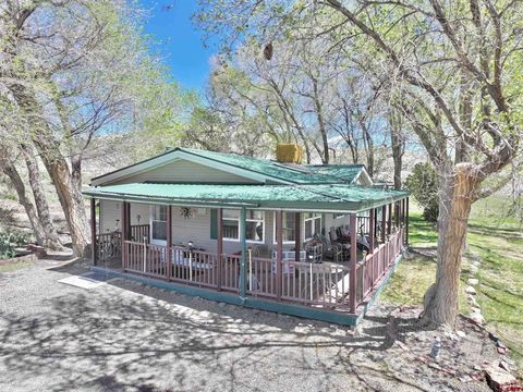 Photo of 67743 LaSalle Road, Montrose, CO 81401 (MLS # 834341)