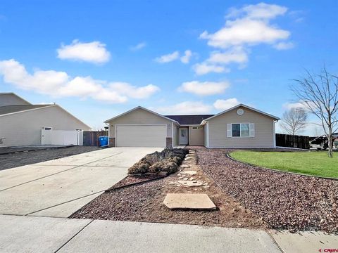 Photo of 22 Roundhouse Street, Montrose, CO 81401 (MLS # 831518)