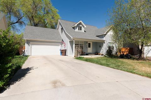 Photo of 301 Colonial Court, Montrose, CO 81401 (MLS # 832958)