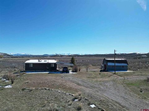 Photo of 22120 Government Springs Road, Montrose, CO 81403 (MLS # 832352)