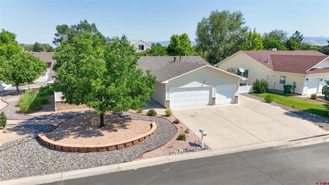 Photo of 1673 Wetterhorn Street, Montrose, CO 81401 (MLS # 837919)
