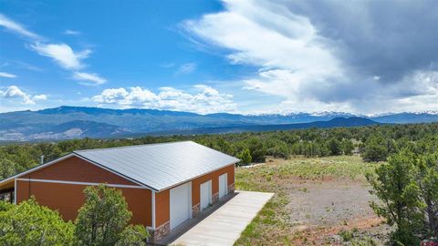 Photo of TBD Cotton Lane, Montrose, CO 81403 (MLS # 824776) Photo of TBD Cotton Lane, Montrose, CO 81403 (MLS # 824776)