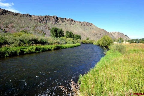 Photo of 120 Tomichi Creek Loop, Gunnison, CO 81230 (MLS # 839018)