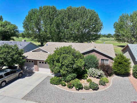 Photo of 819 Heather Lane, Montrose, CO 81401 (MLS # 836150)