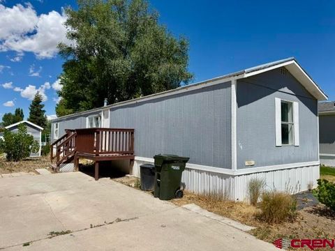 Photo of 62880 LaSalle Road #104, Montrose, CO 81401 (MLS # 836868)