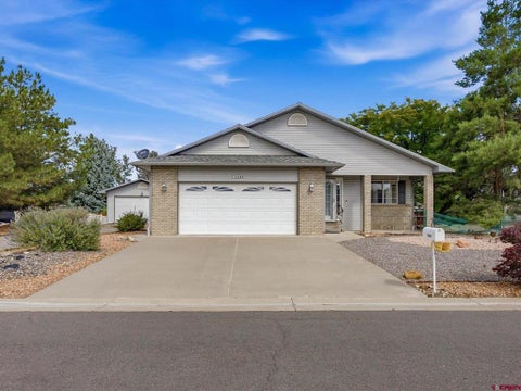 Photo of 1689 Wetterhorn Street, Montrose, CO 81401 (MLS # 839336)