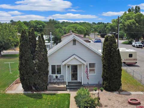 Photo of 1403 Bluff Street, Delta, CO 81416 (MLS # 836284)