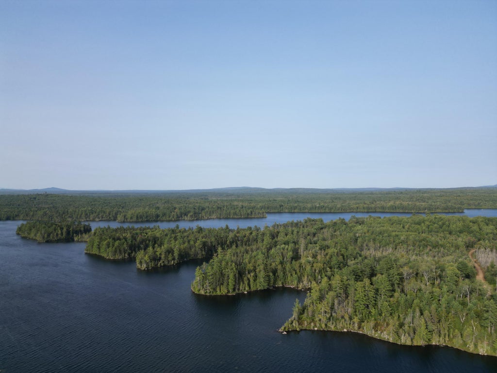 Photo of Lot 1 Off North Shore Road, Lake View Plt, ME 04463 (MLS # 1680508)