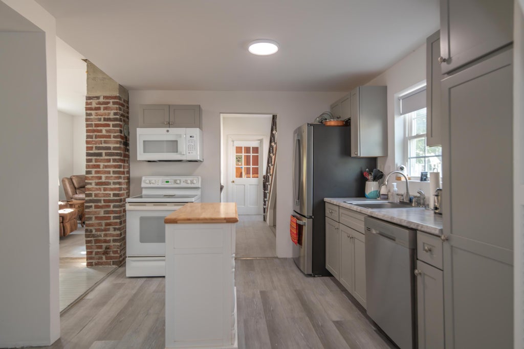 Photo of 94 S Maple Street, Greenville, ME 04441 (MLS # 1682821)