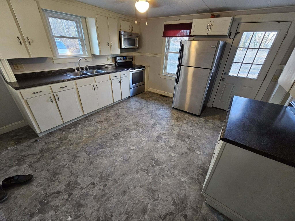 Photo of 31 Tibbetts Street, Brewer, ME 04412 (MLS # 1685192)