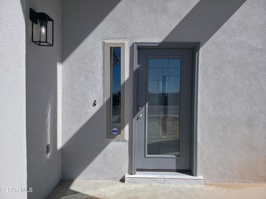 Photo of 9947 Marie Ann Place, Socorro, TX 79927 (MLS # 932860)