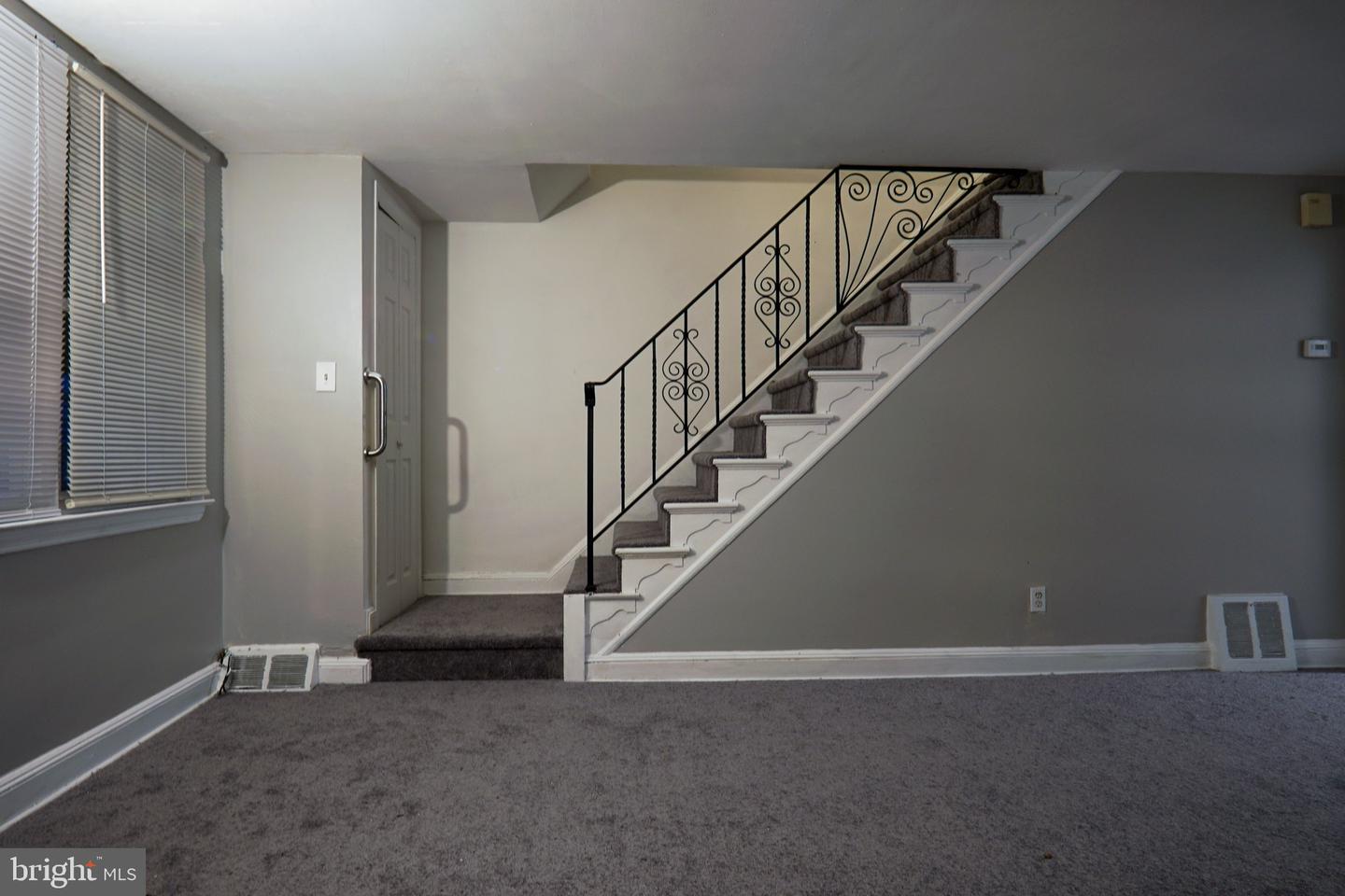 Photo 2 of 12 of 223 W 22nd St townhome