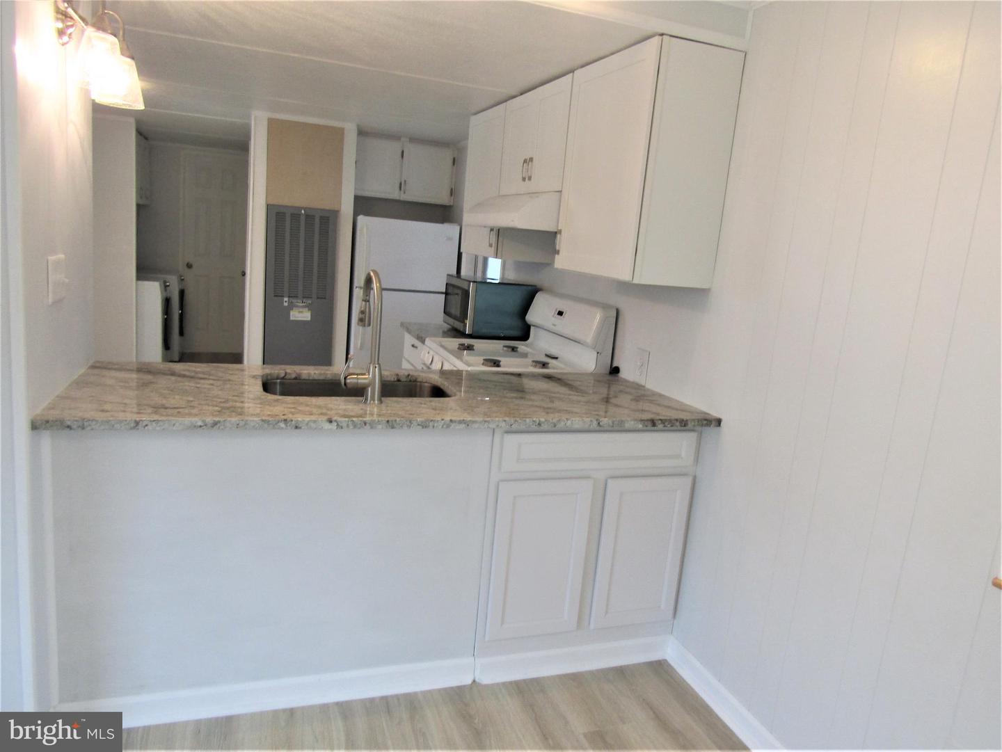 Photo 11 of 28 of 8049 Veterans Hwy #Trlr 52 mobile home