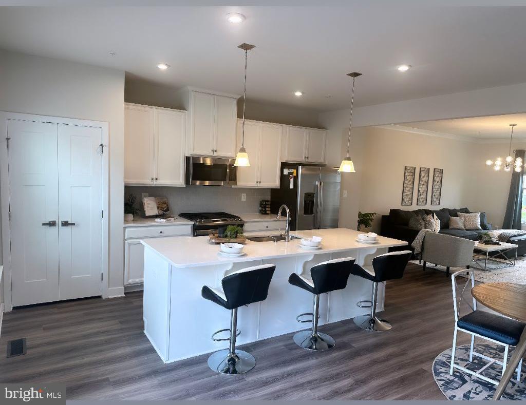 Photo 3 of 37 of 6063 Piscataway St townhome