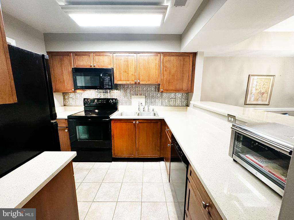 Photo 4 of 22 of 5704 CHAPMAN MILL DR #310 condo
