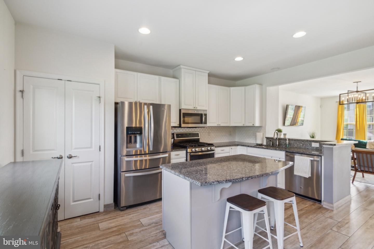 Photo 11 of 23 of 46 Village Green Ln townhome