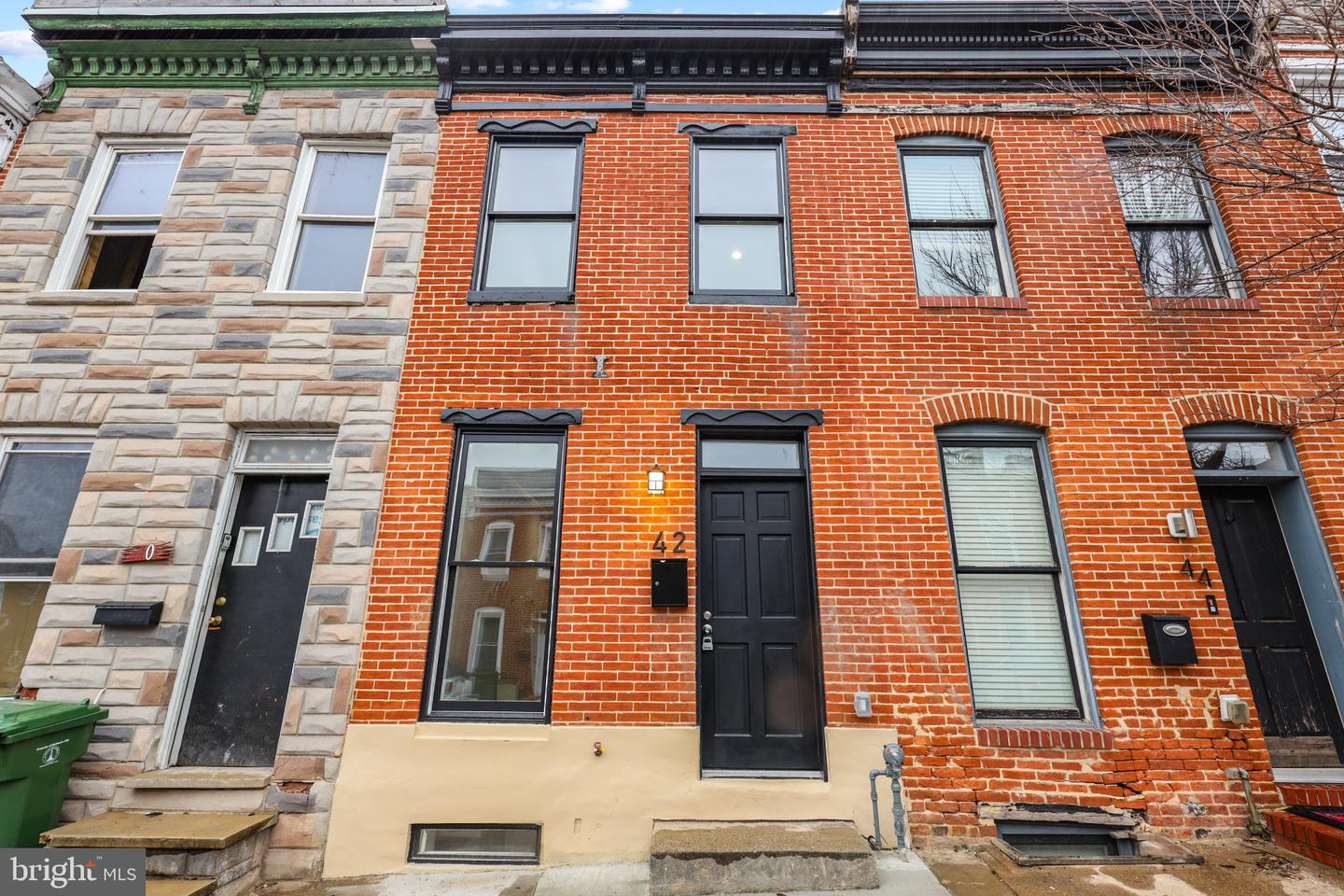 Photo 1 of 38 of 42 E Heath St townhome