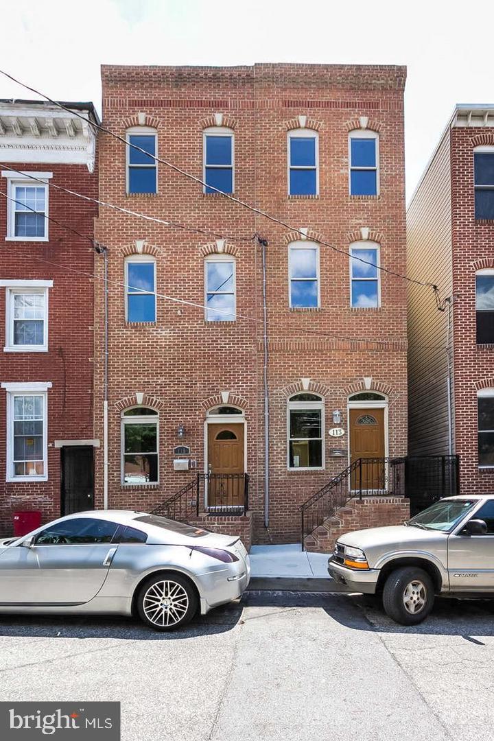 Photo 2 of 33 of 115 E Cross St townhome