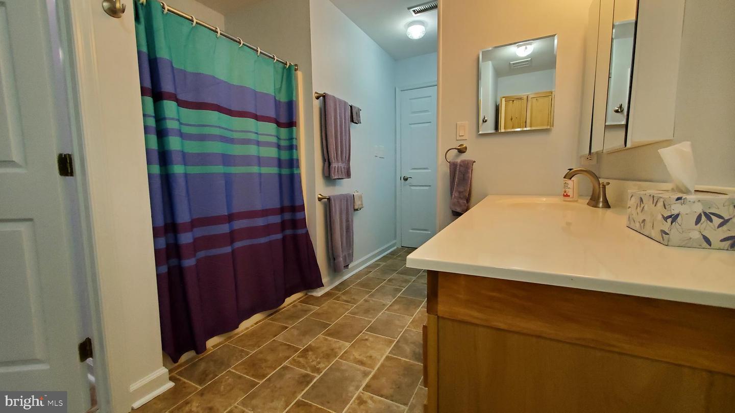 Photo 11 of 21 of 25 E Village Rd townhome