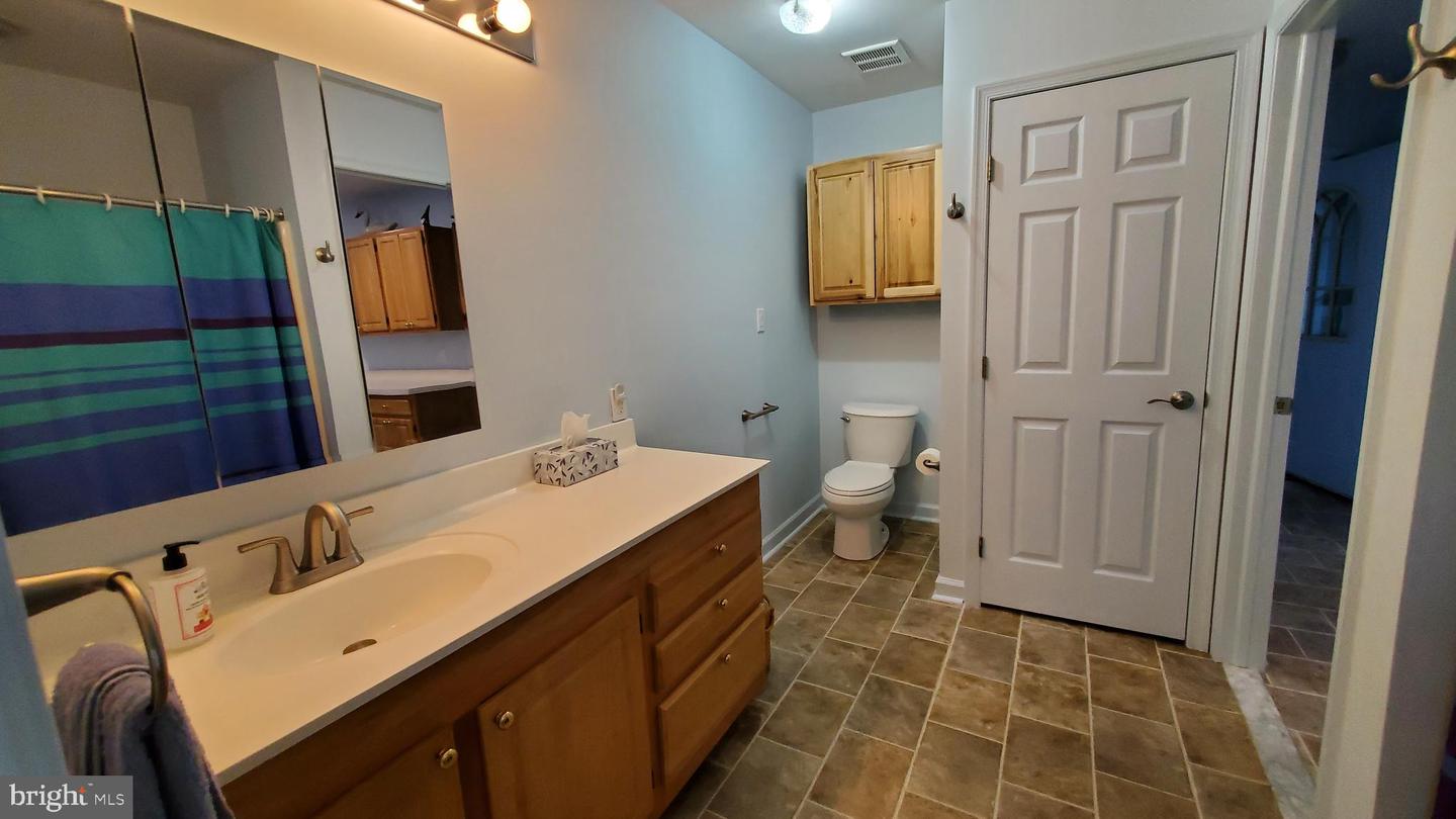 Photo 12 of 21 of 25 E Village Rd townhome