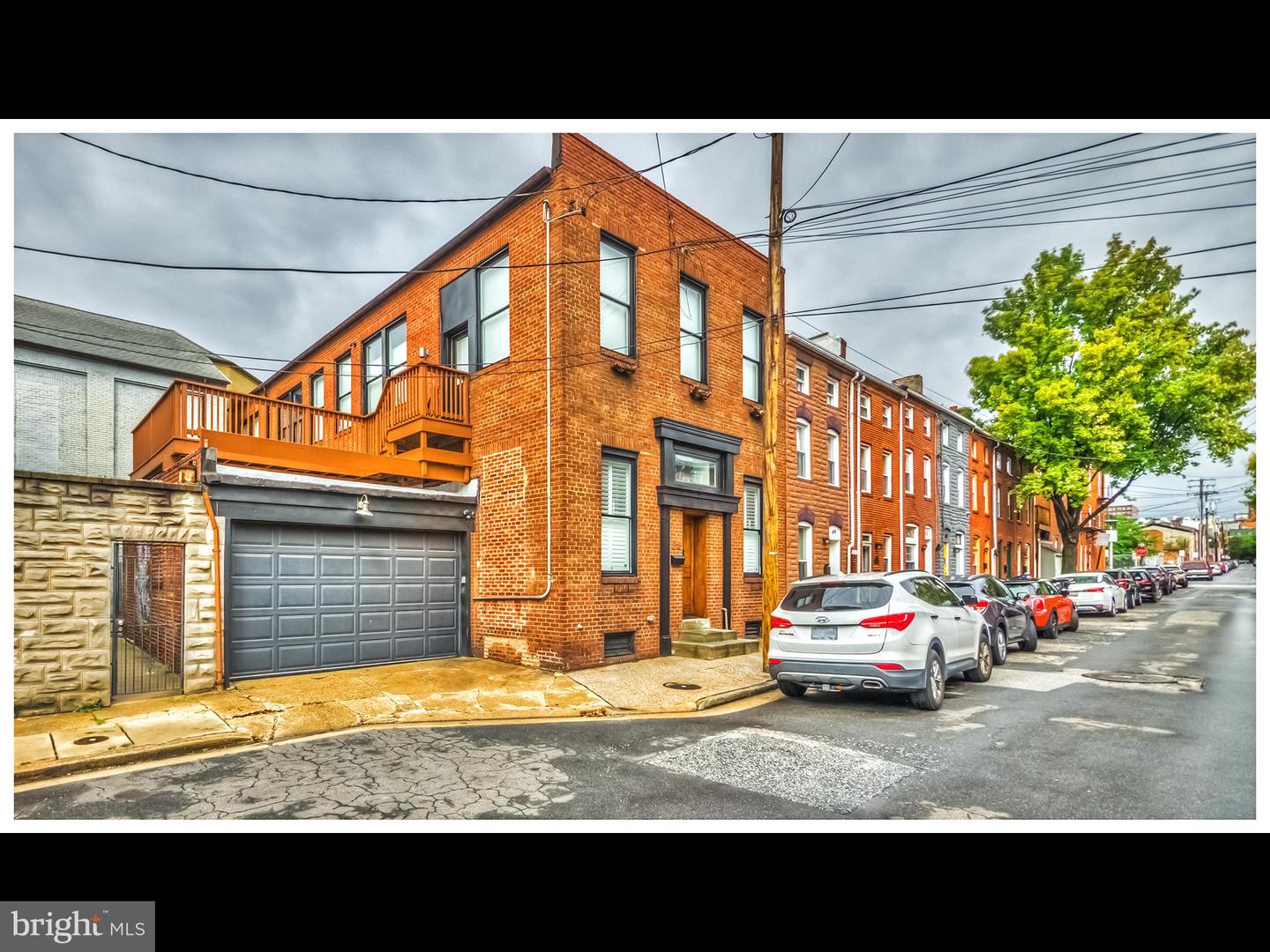 Photo 2 of 64 of 318 S Regester St townhome