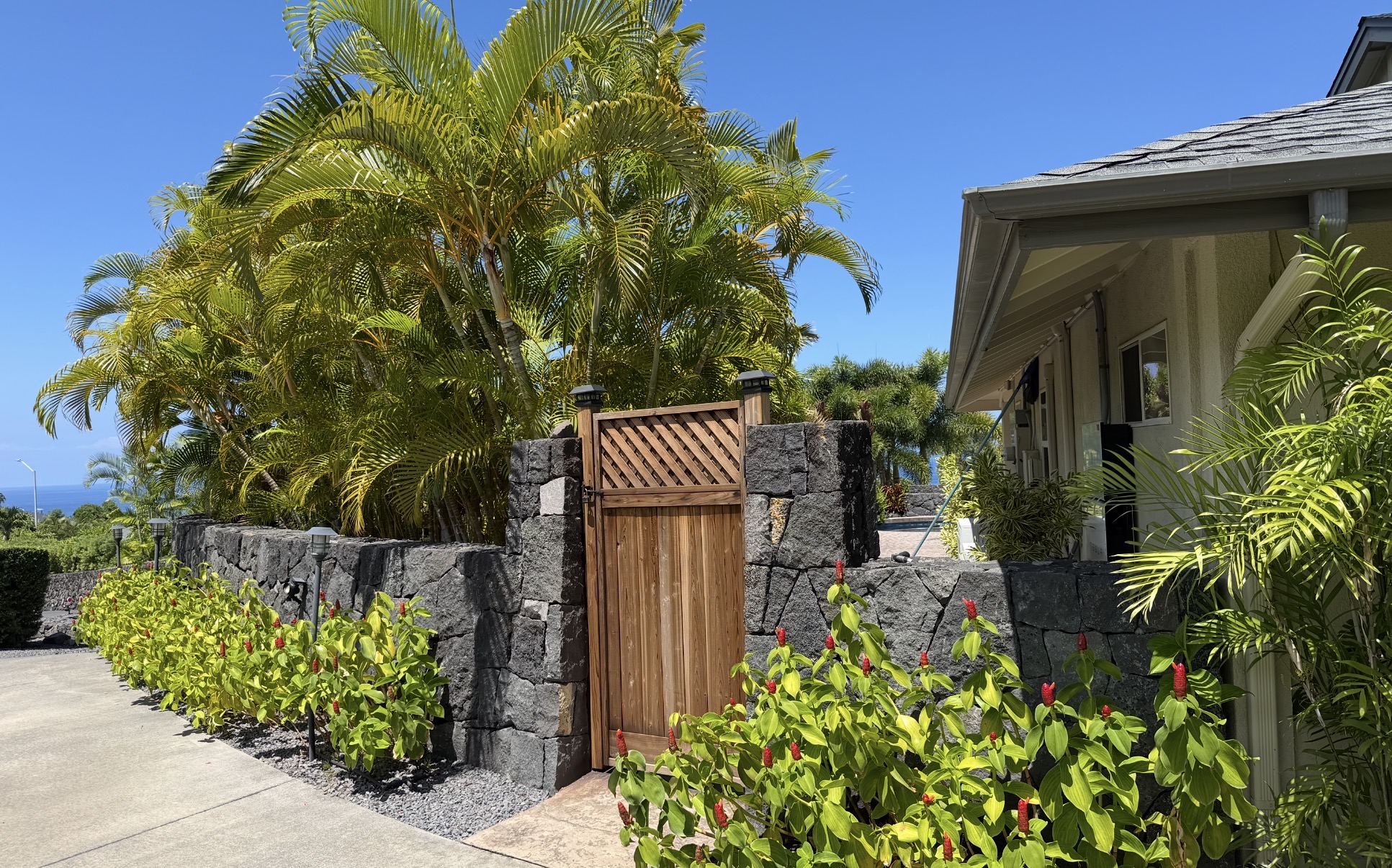 Side gate near front entry in lovely Ali'i Heights.
