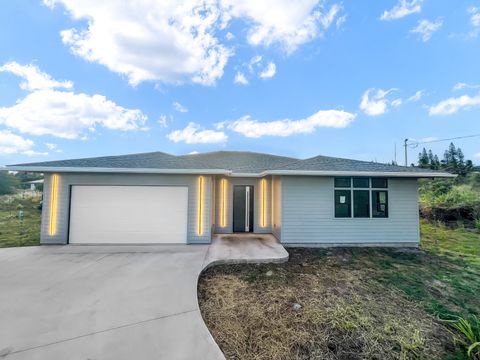 Photo of 94-5883 Kalai Waa Pl, Naalehu, HI 96772 (MLS # 721072)